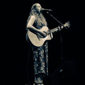 Amy Pegg Playing Guitar